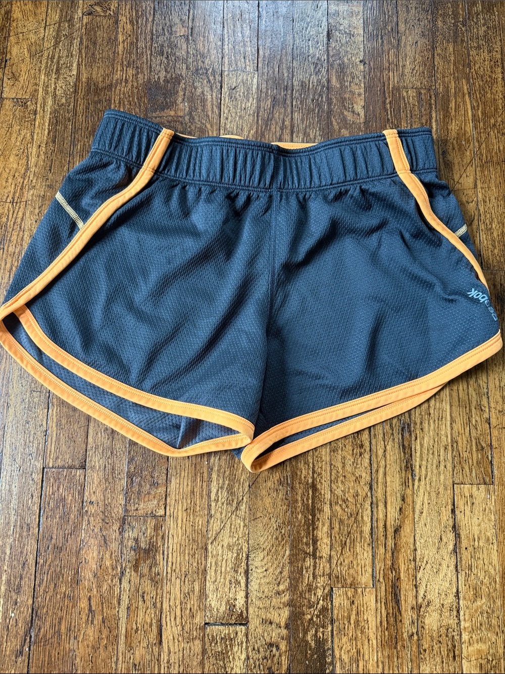 Women’s Reebok in Dark Gray with Orange Trim